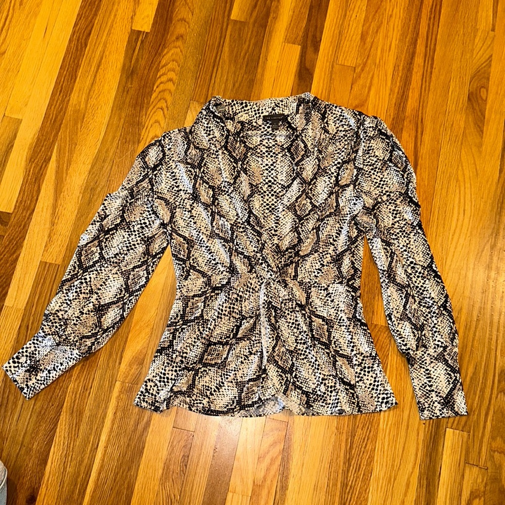 The limited snake skin print blouse